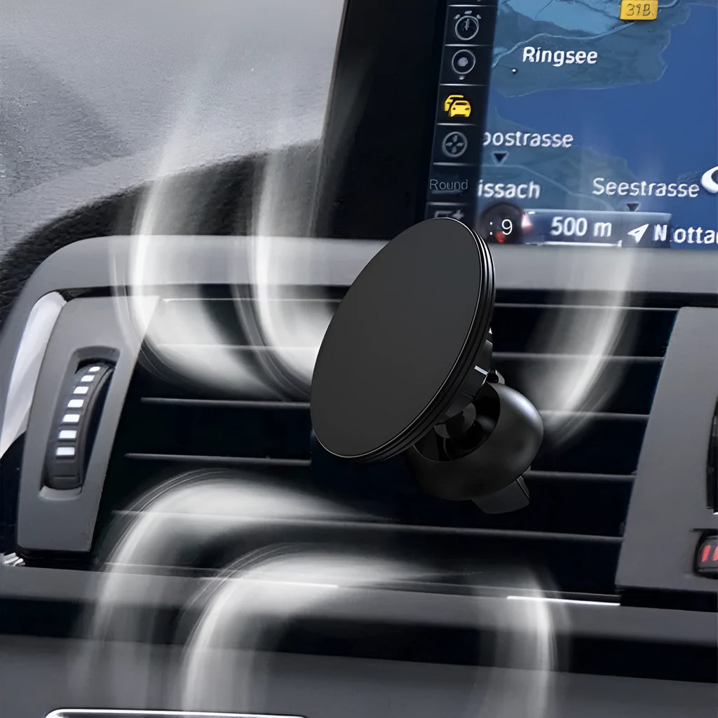 Black aluminium magnetic car air vent phone holder mounted on vehicle centre console