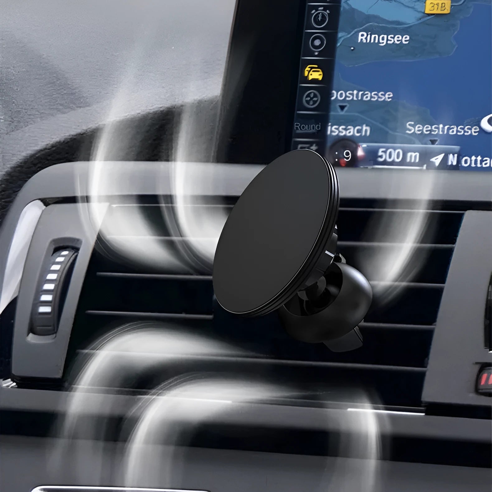 Black aluminium magnetic car air vent phone holder mounted on vehicle centre console