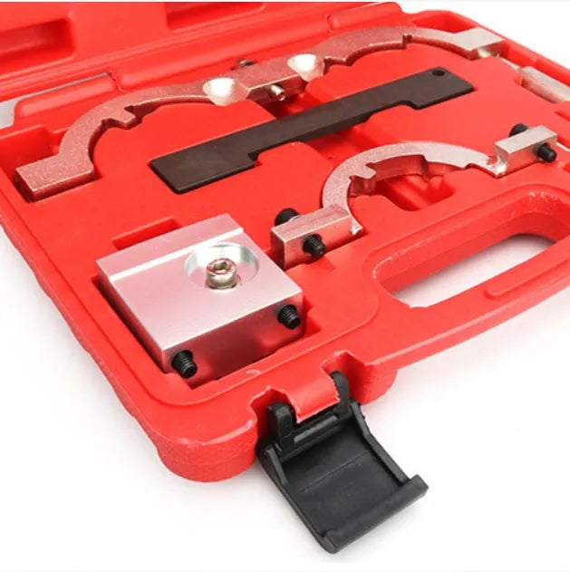 Red timing tool kit for Opel 1.4T LUJ engine with seven chrome-vanadium steel tools on a workbench.