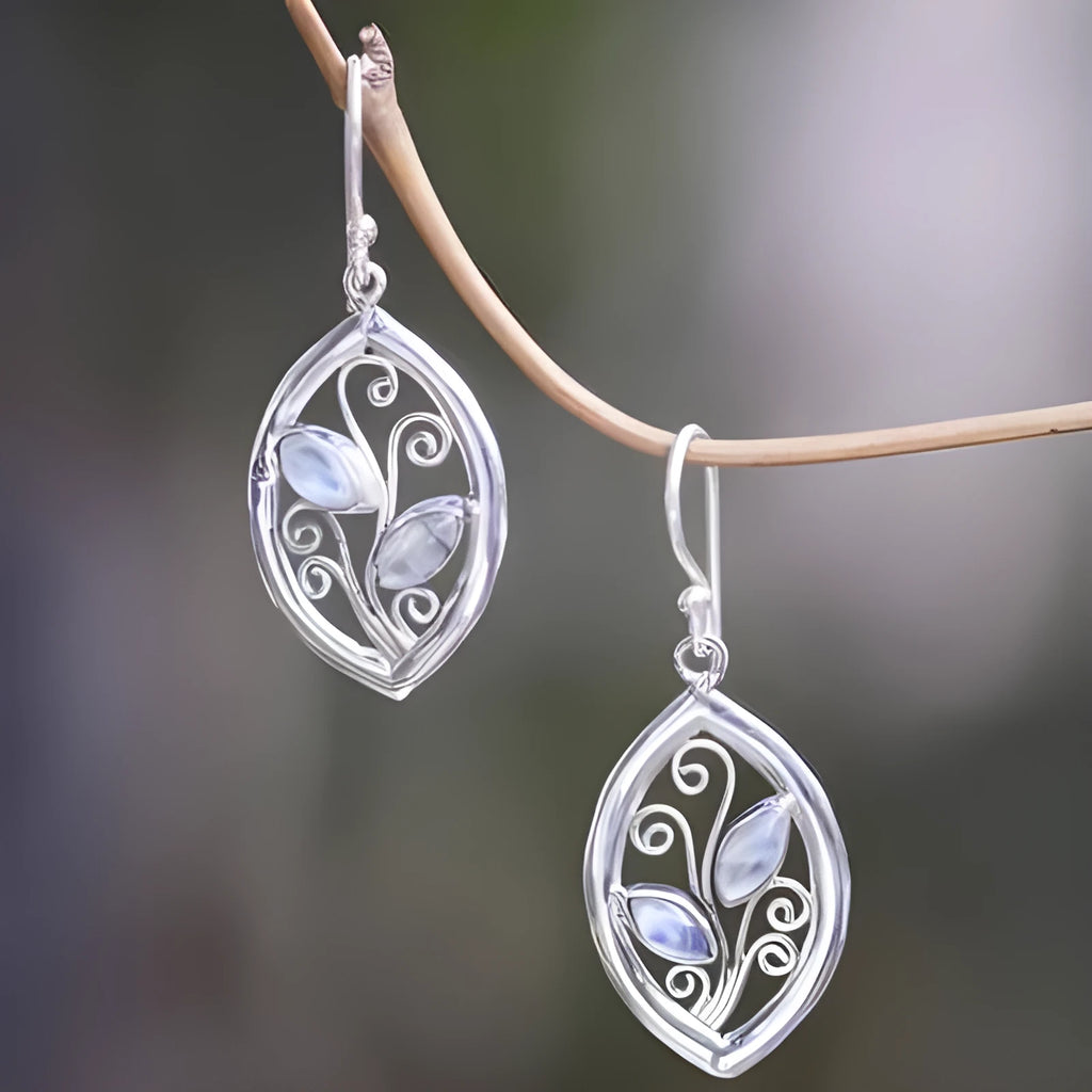 Women's silver alloy leaf earrings with embedded colourful moonstone and diamond treatment
