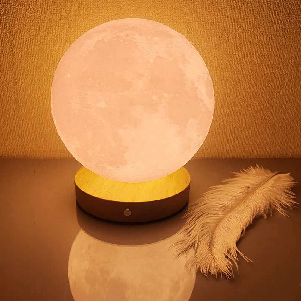 Rotating moon night lamp with wooden base showing wireless control and three colour settings