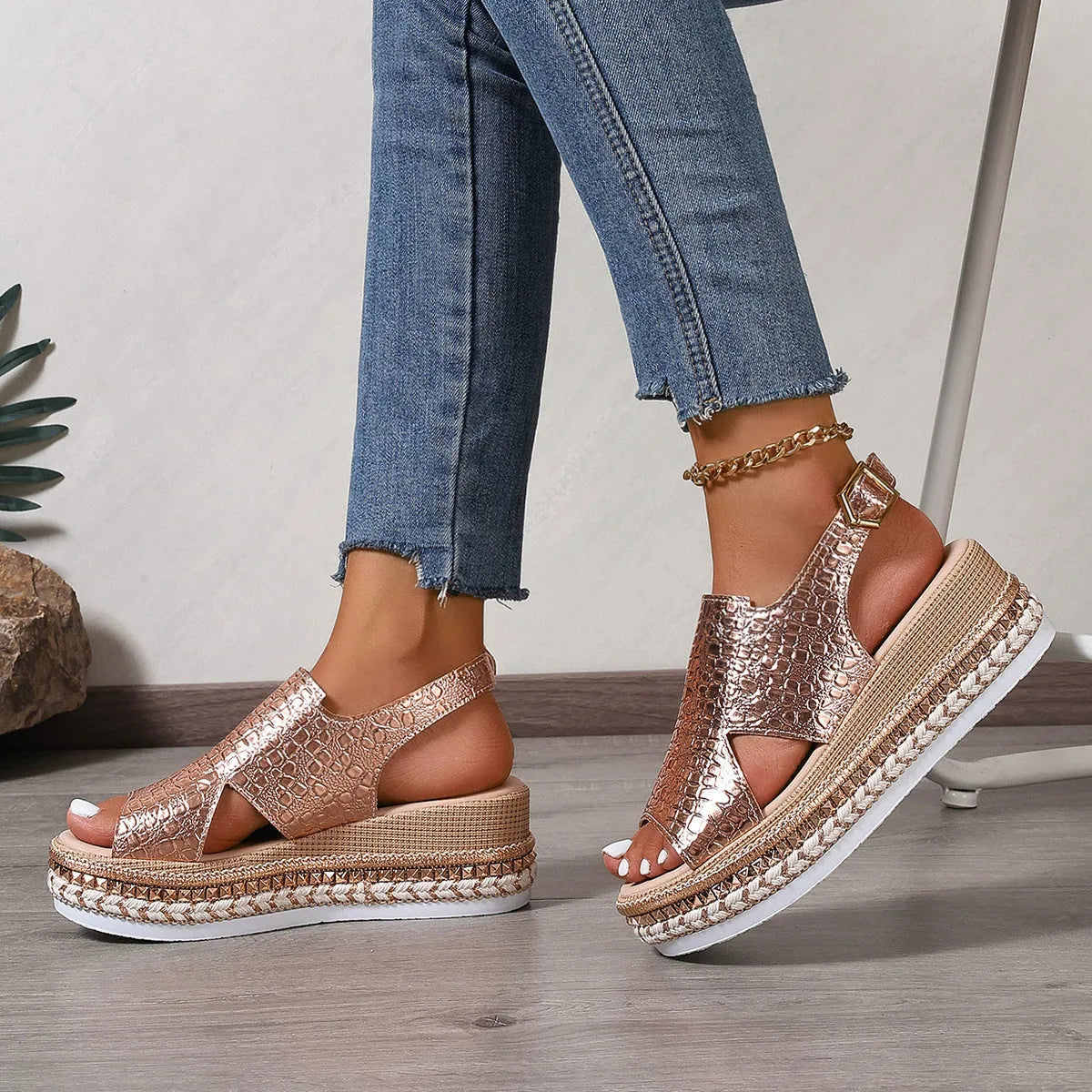 Gold roman sandals with round toe, ankle buckle, and hollow-out patterns on PU upper