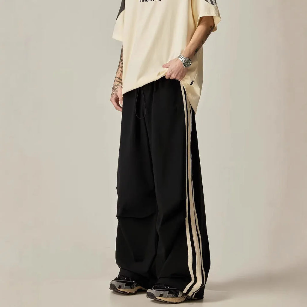 Black wide leg climbing trousers for men with high waist and straight leg cut