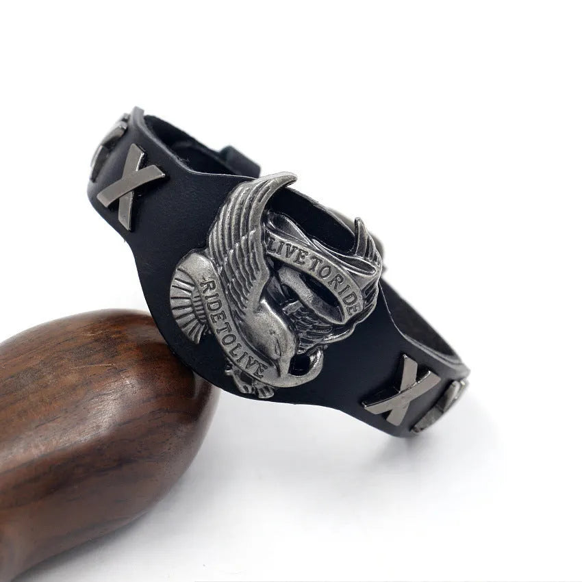 Black leather bracelet with eagle alloy watch-buttom clasp showing geometric shape