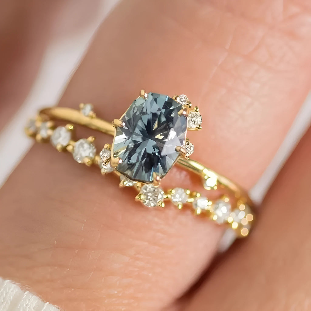 Gold plated floral fashion ring with green zircon stone inlay on finger