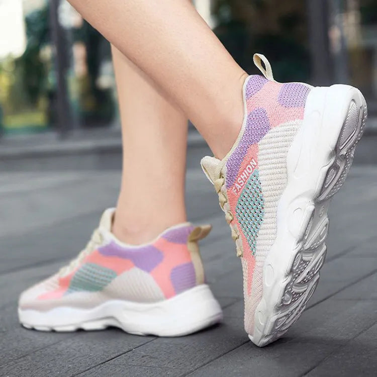 Casual colourblock lace-up sneakers for women with blue mesh upper, round toe, and white sole on a light background