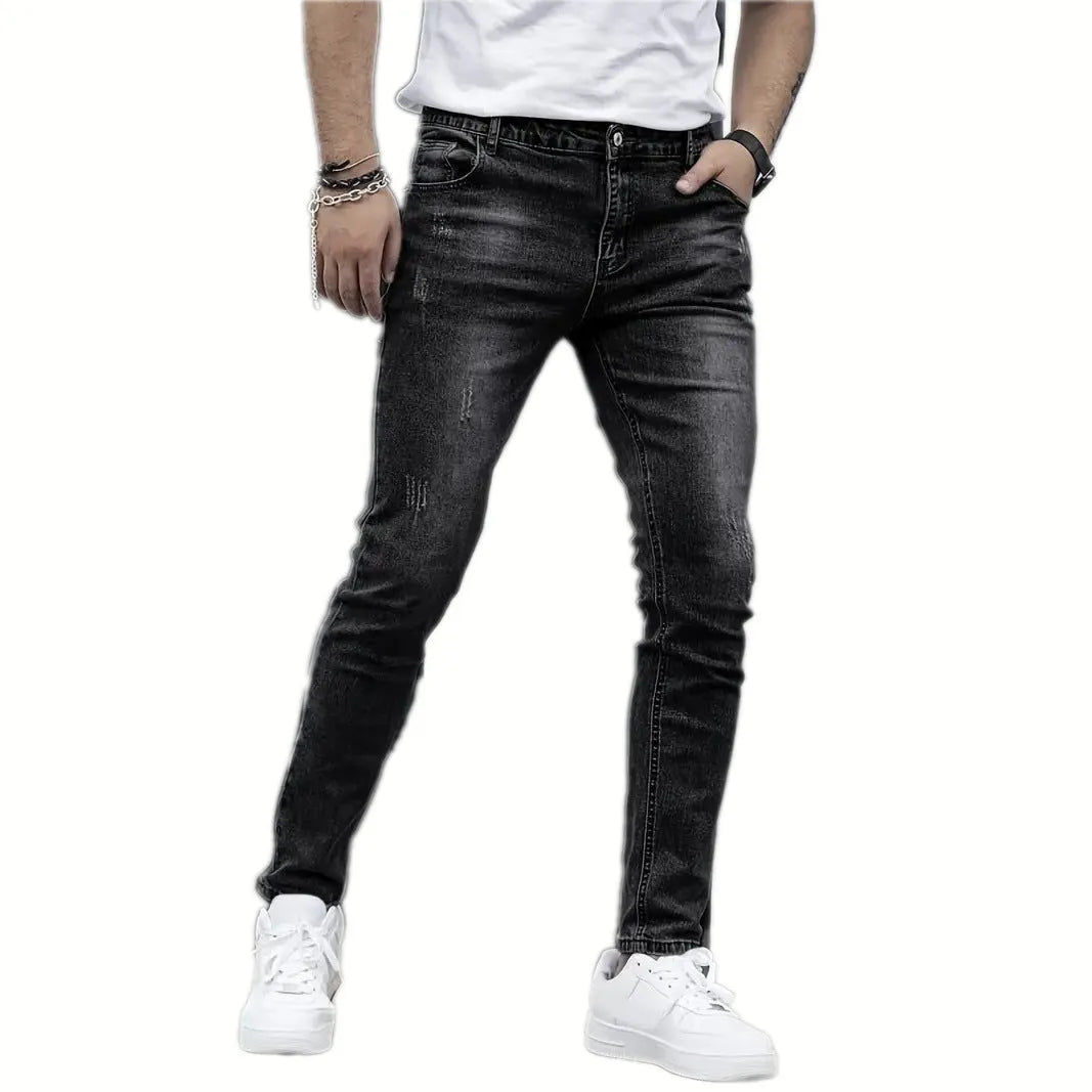 Men's black straight leg skinny stretch jeans with a mid waist and zipper fly.