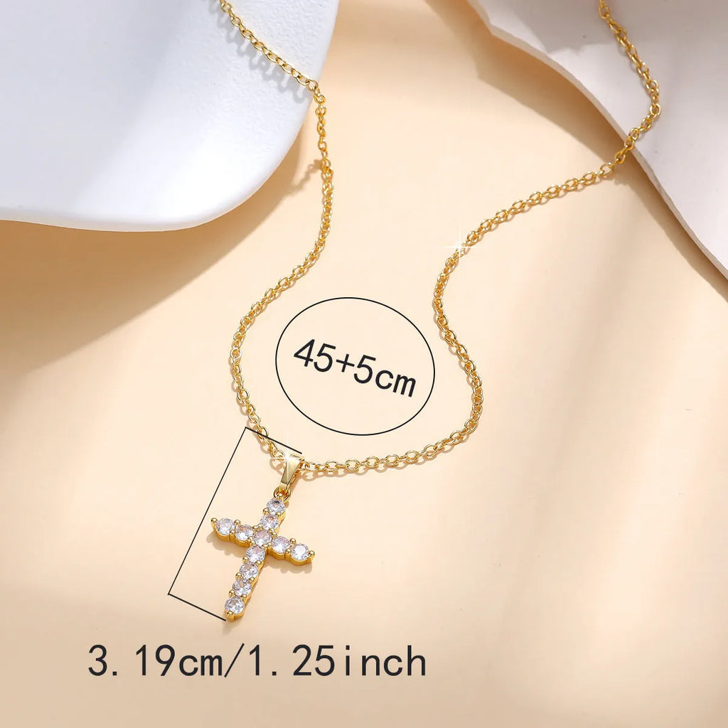 Gold plated cross necklace for women with cubic zirconia stones on a 45 cm chain, shiny finish