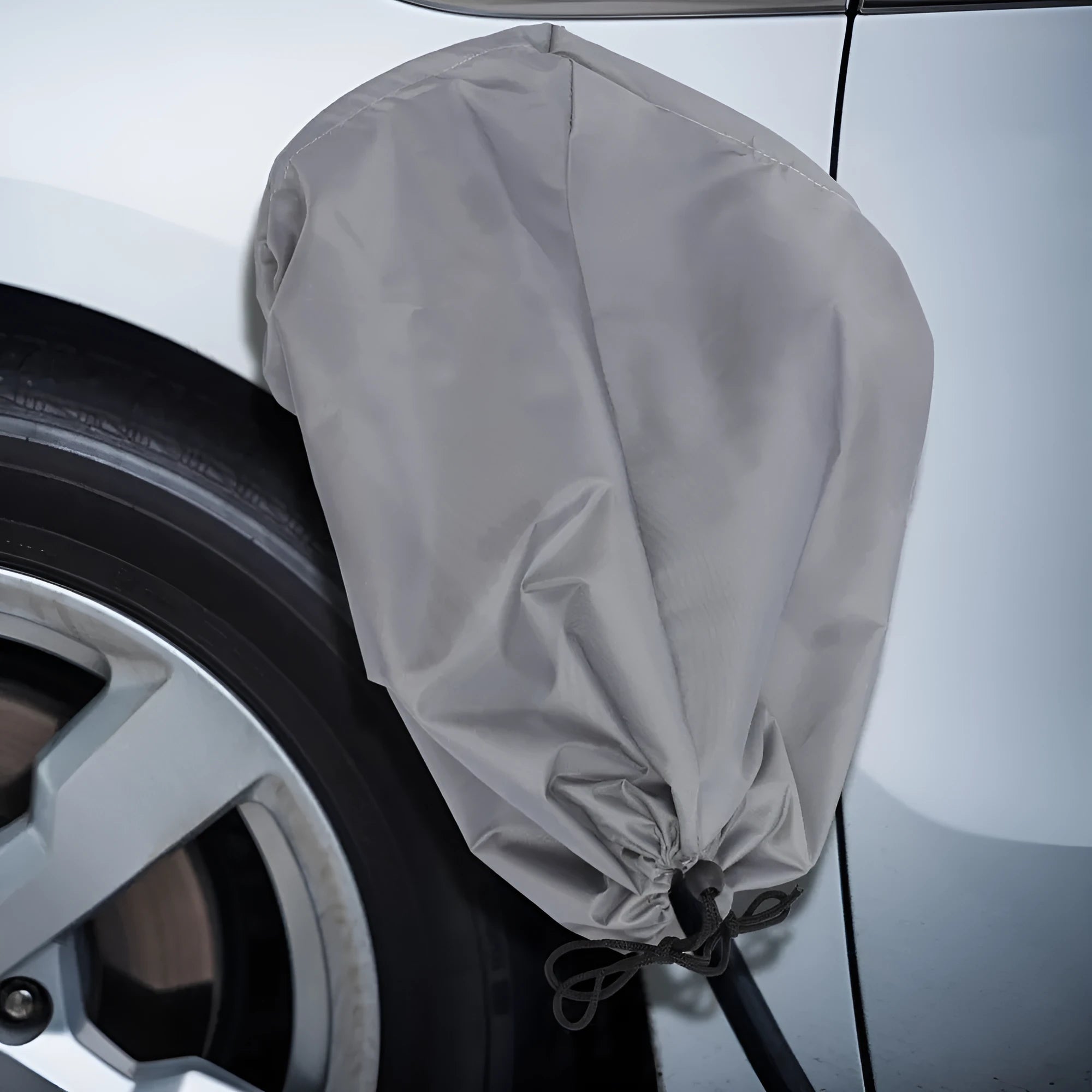 Waterproof cover for new energy vehicle charging with drawstring closure in grey colour