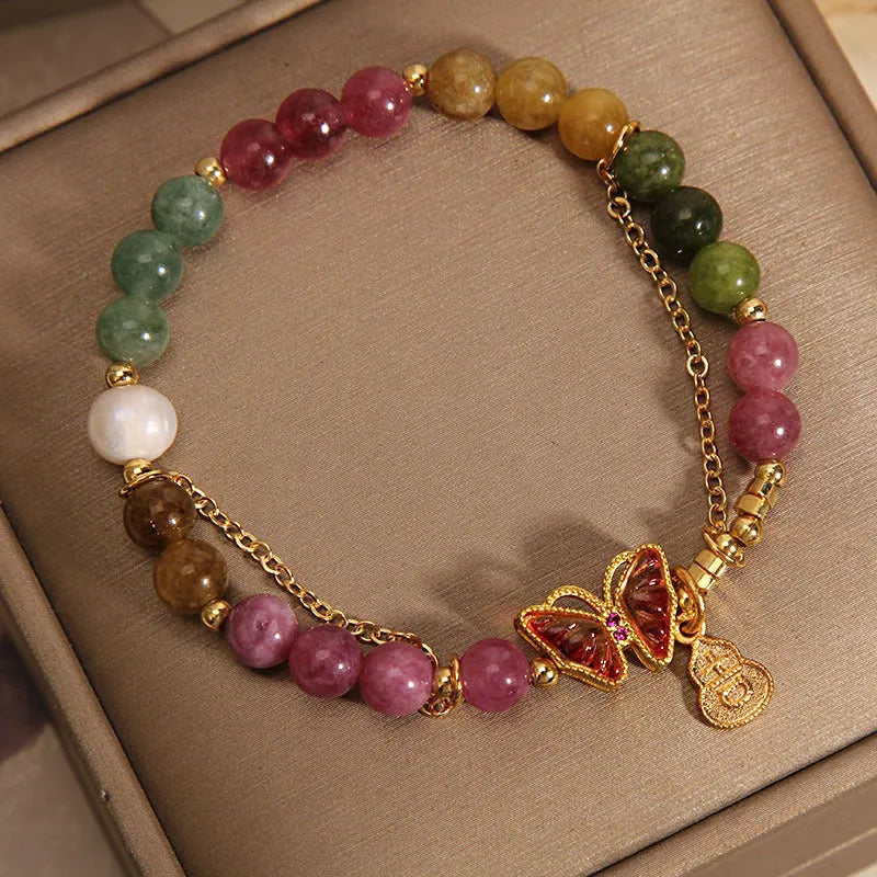 Natural jade coloured agate bracelet with a butterfly gourd design for women.