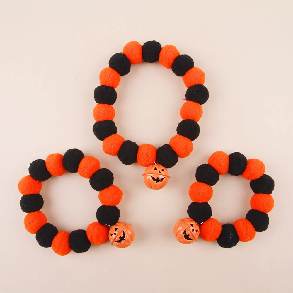 Orange Halloween pumpkin costume collar for cats with adjustable strap in sizes S, M, L.