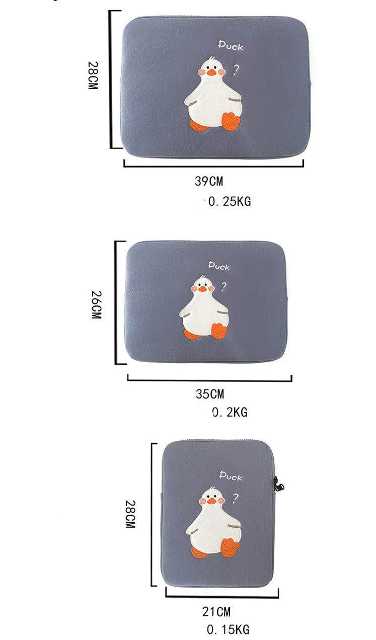 Blue cotton tablet case with embroidered cartoon duck design and zipper closure.