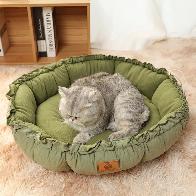 Grey and green reversible donut cat bed for indoor cats with raised sides
