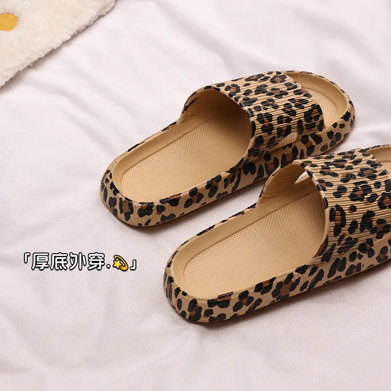Women's leopard print EVA slippers with thick sole on a white background