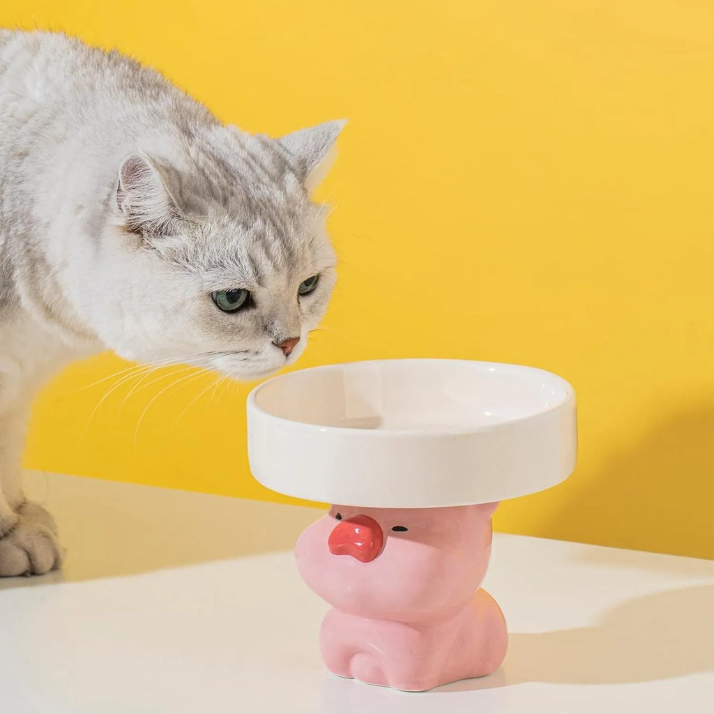 Ceramic raised cat bowl with animal design showing 12.5 cm height and 15 cm width