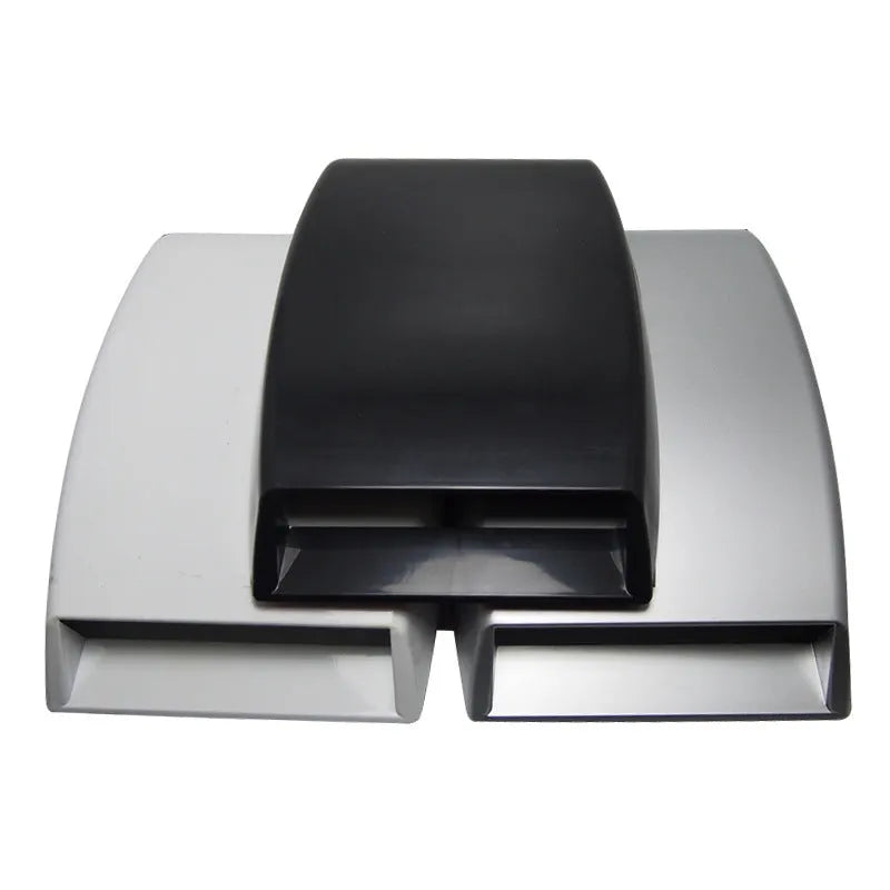 Black, white, and silver ABS plastic car decoration simulation air vent with tapered design.