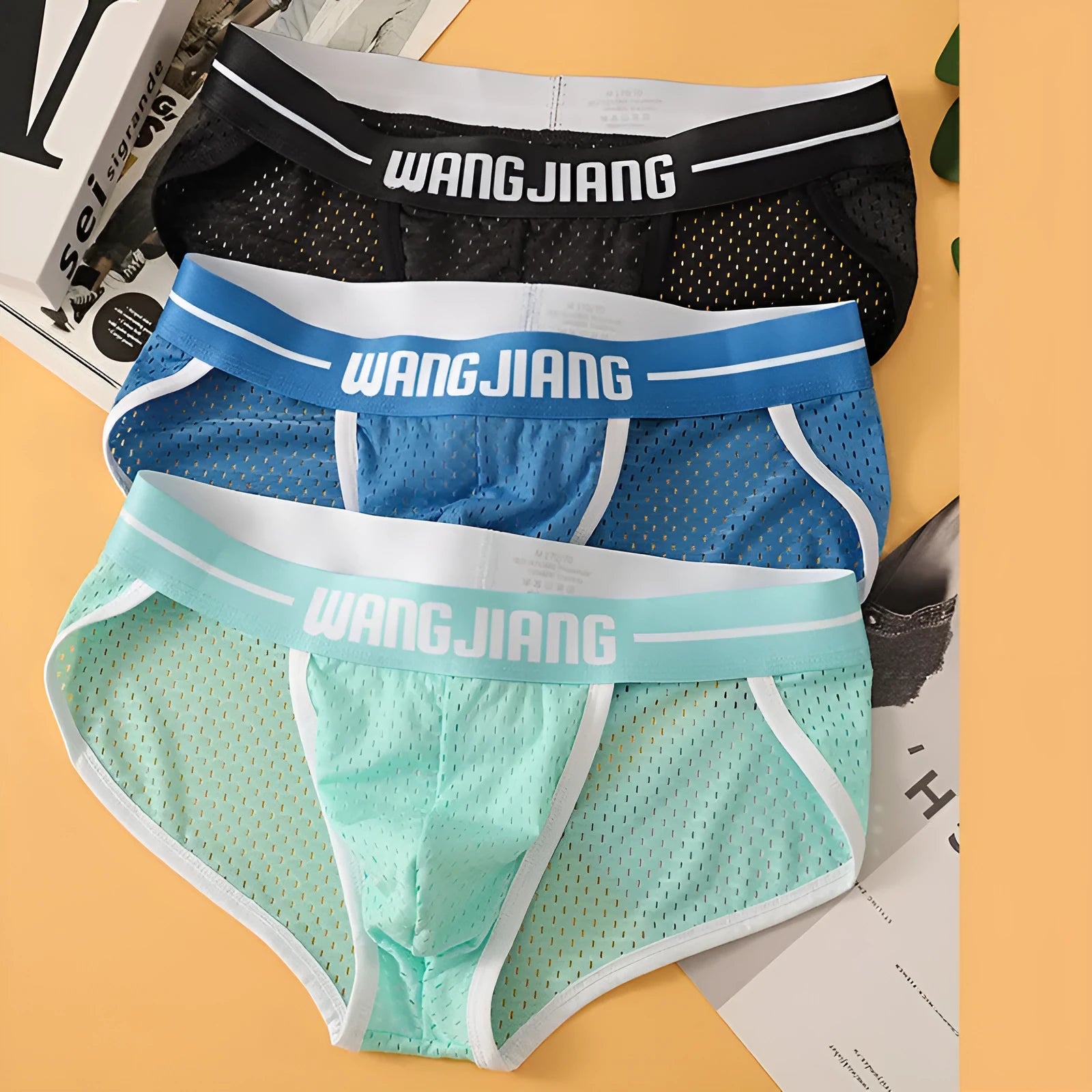 Men's ice silk triangle underwear in black, white, grey, blue, pink, or light green