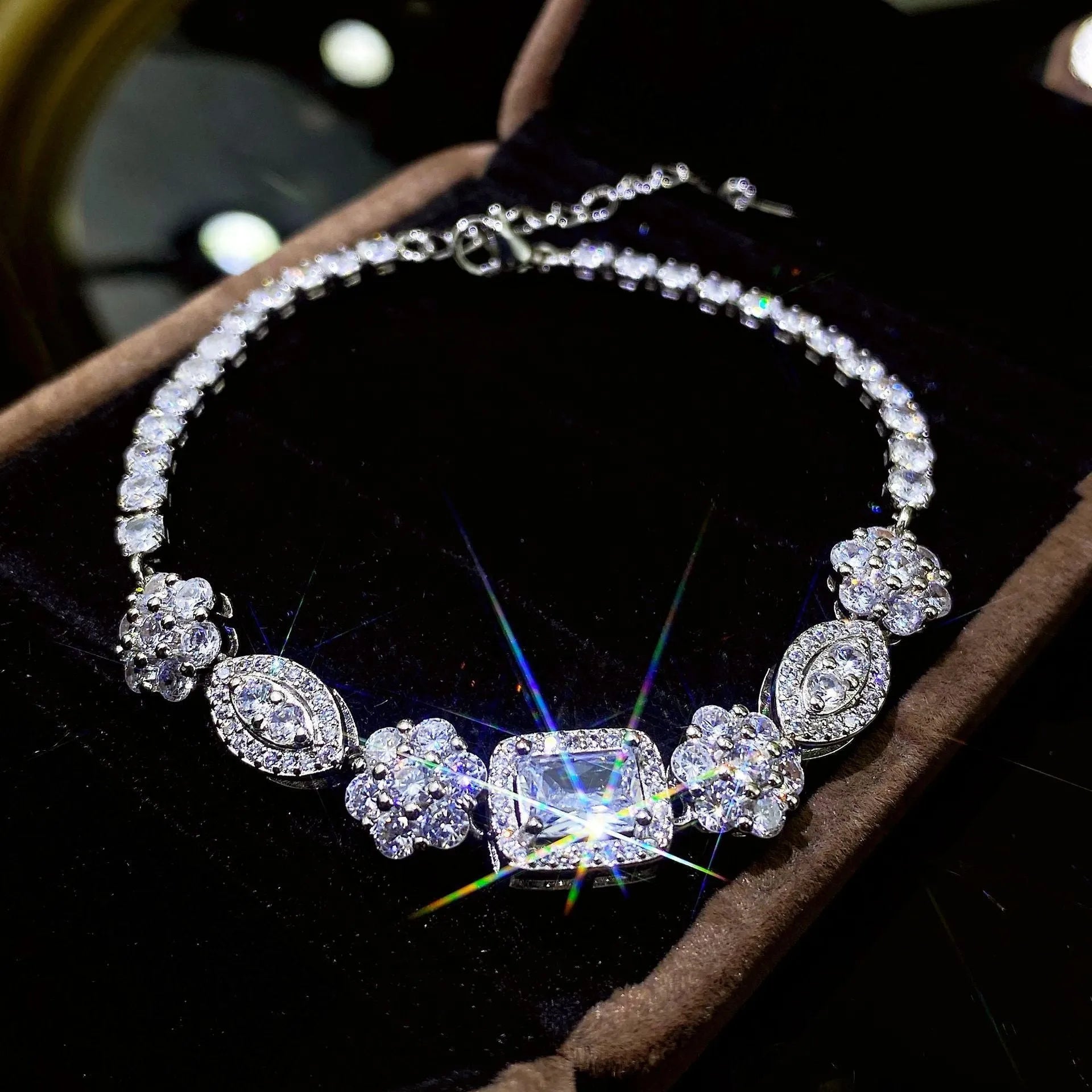 Women's S925 sterling silver-plated bracelet with white gold finish and inlaid zircon stones.