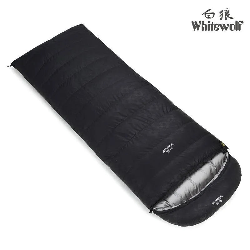 Black outdoor sleeping bag with envelope structure, filled with white goose down.