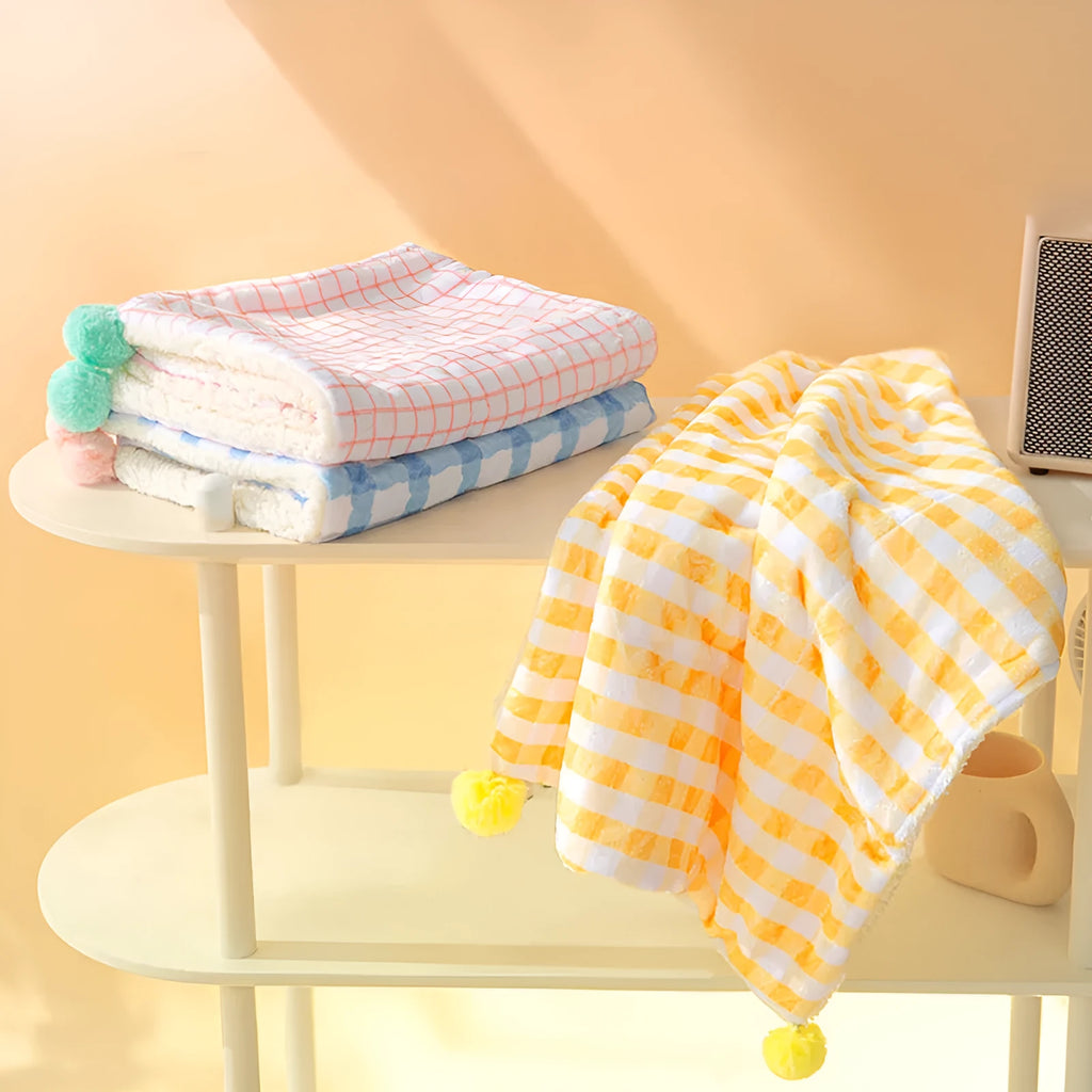 Blue coral fleece pet blanket shown on a dog bed, with size options S M L XL displayed.