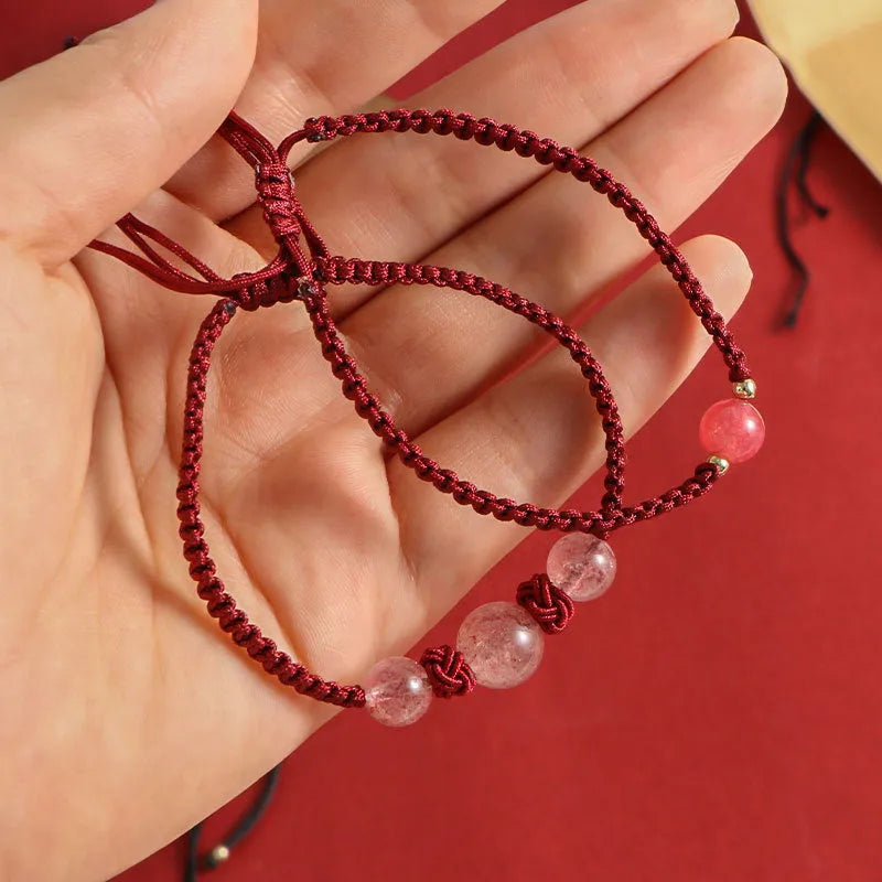 Woven red rope bracelet with spherical natural stone beads and alloy clasp