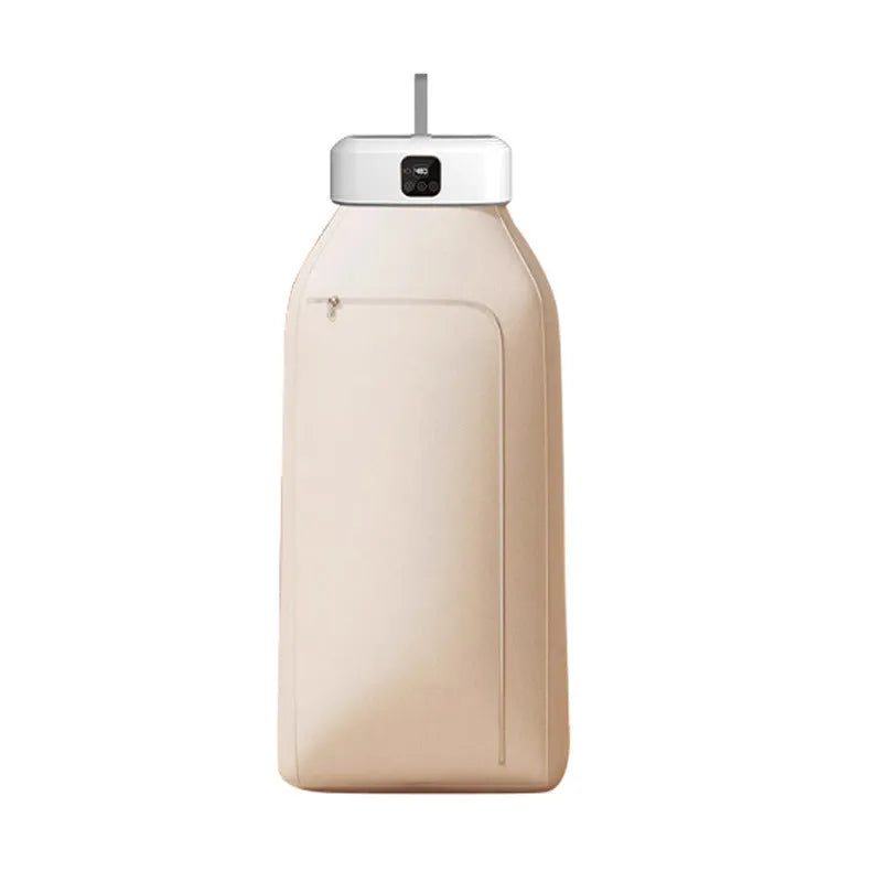 White cylindrical foldable portable clothes dryer with remote control on wooden surface