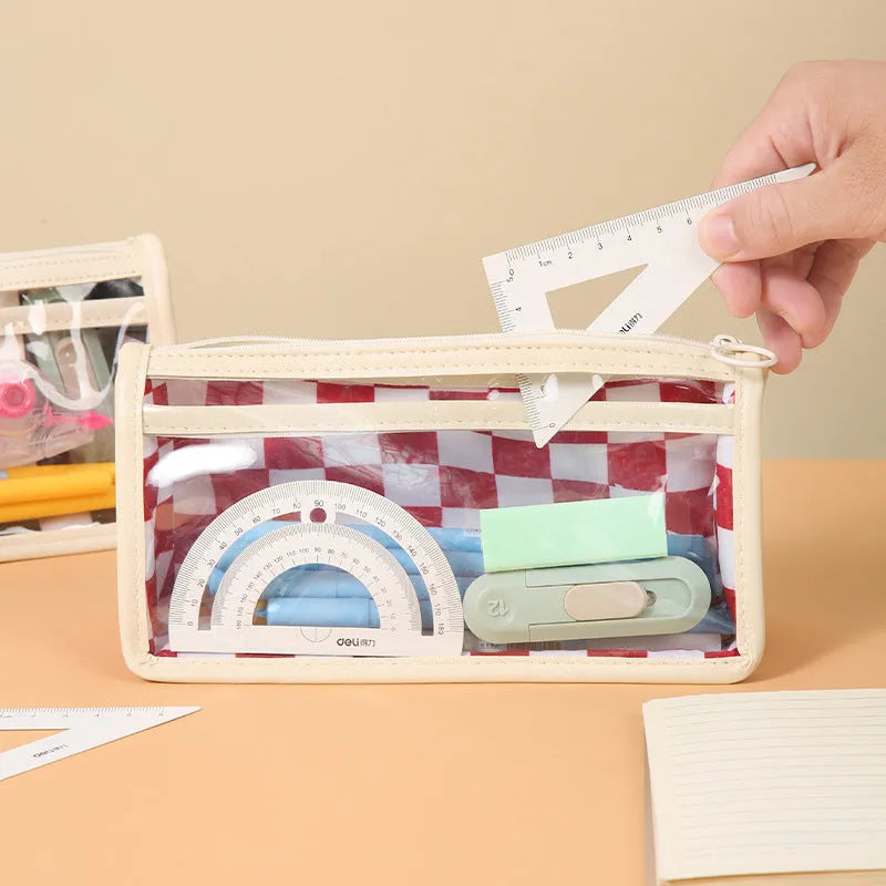 Transparent PVC pencil case with chessboard pattern, showing pens inside, dimensions 21.5cm by 8cm by 11.5cm