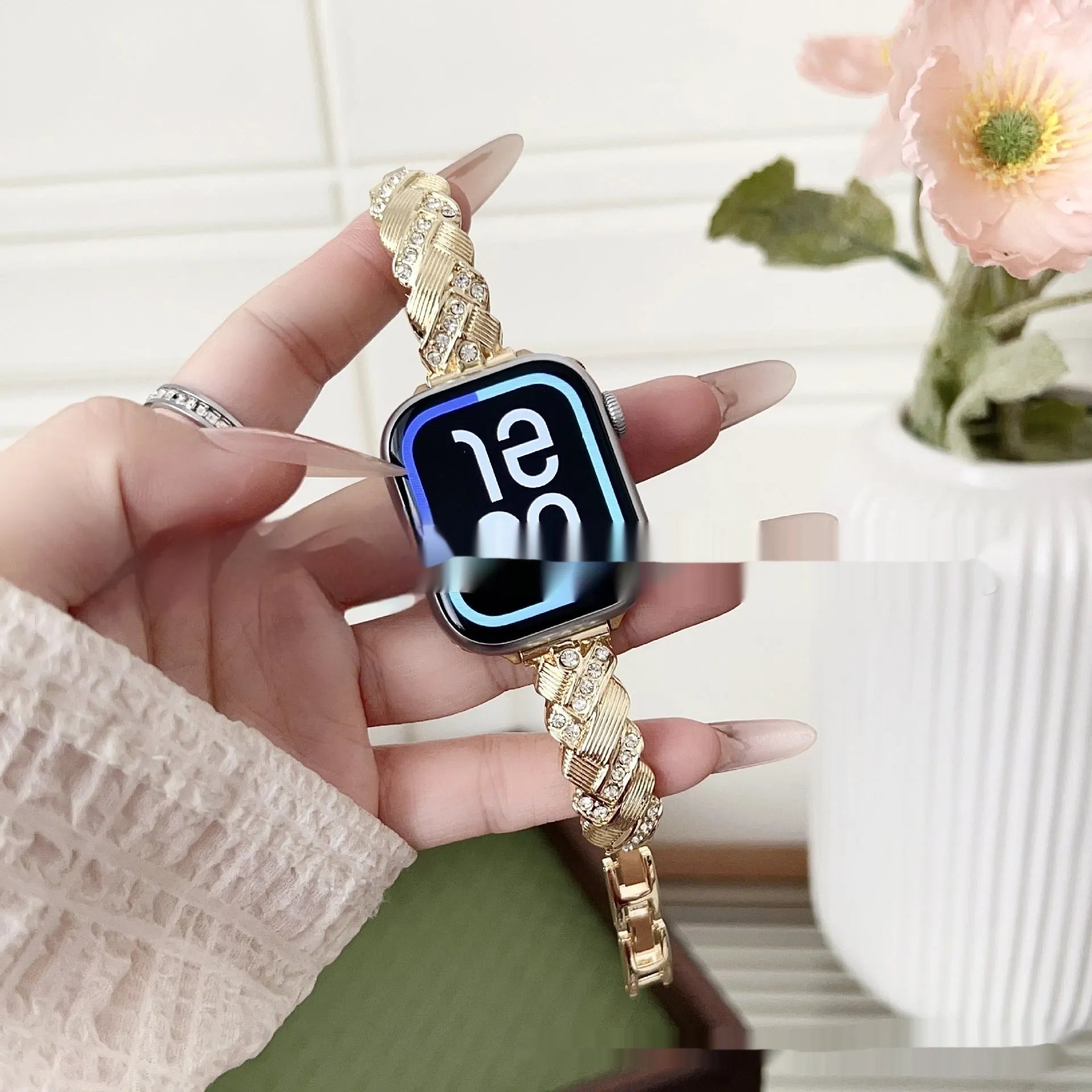 Zinc alloy metal watch strap for iPhone in silver, rose gold, gold, black, and starlight colour options on a grey background.