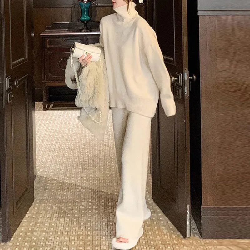 Women's casual long sleeve sweater and wide leg trousers two-piece set in solid colour.