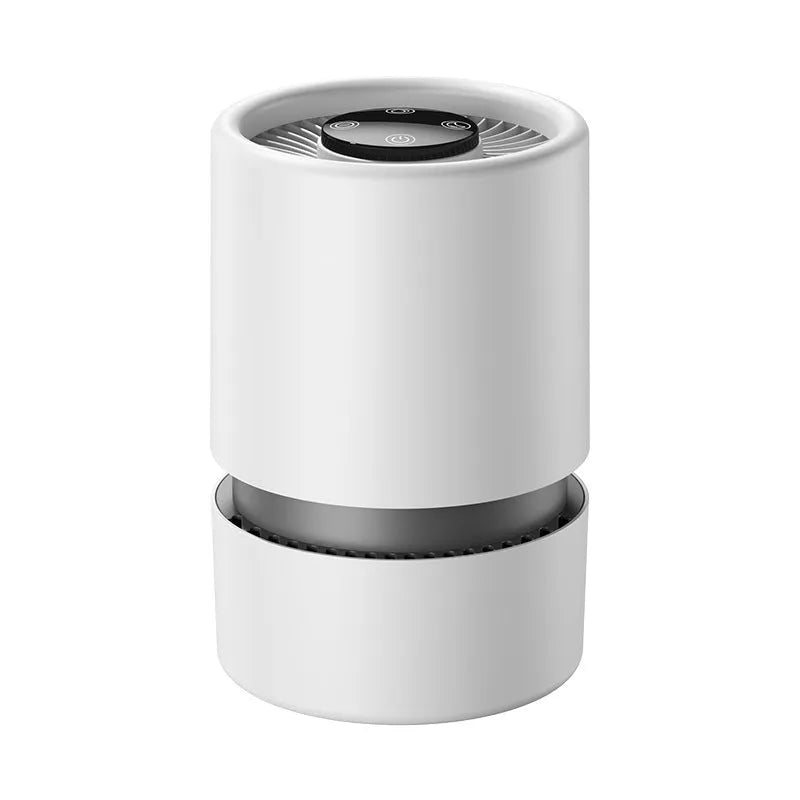 White simple-style desktop air purifier with USB cable on a wooden desk.
