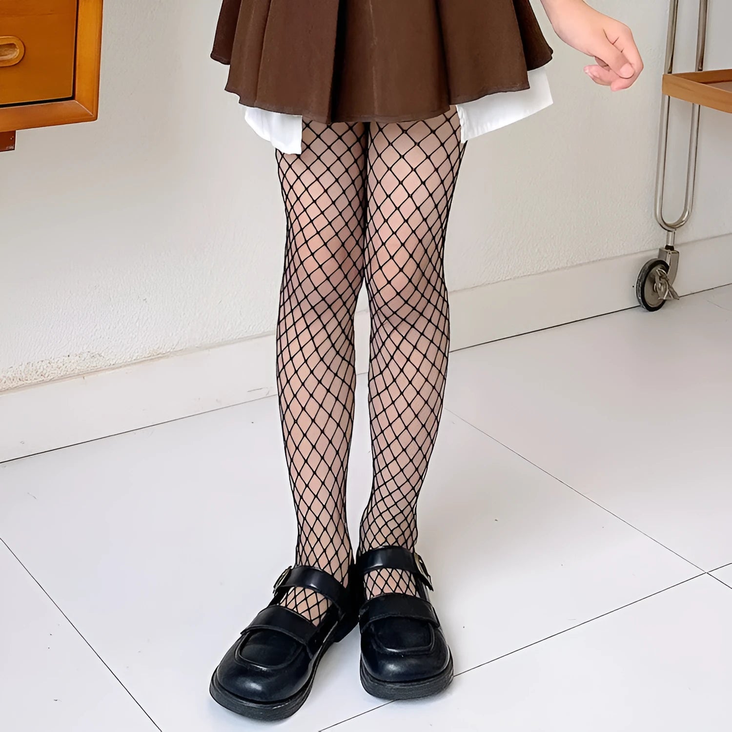 Women's summer mesh stockings showing large, medium and small pattern variations in black and white colours