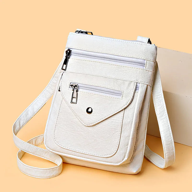 Vertical square crossbody mobile phone bag for women in PU material with sewing line detailing