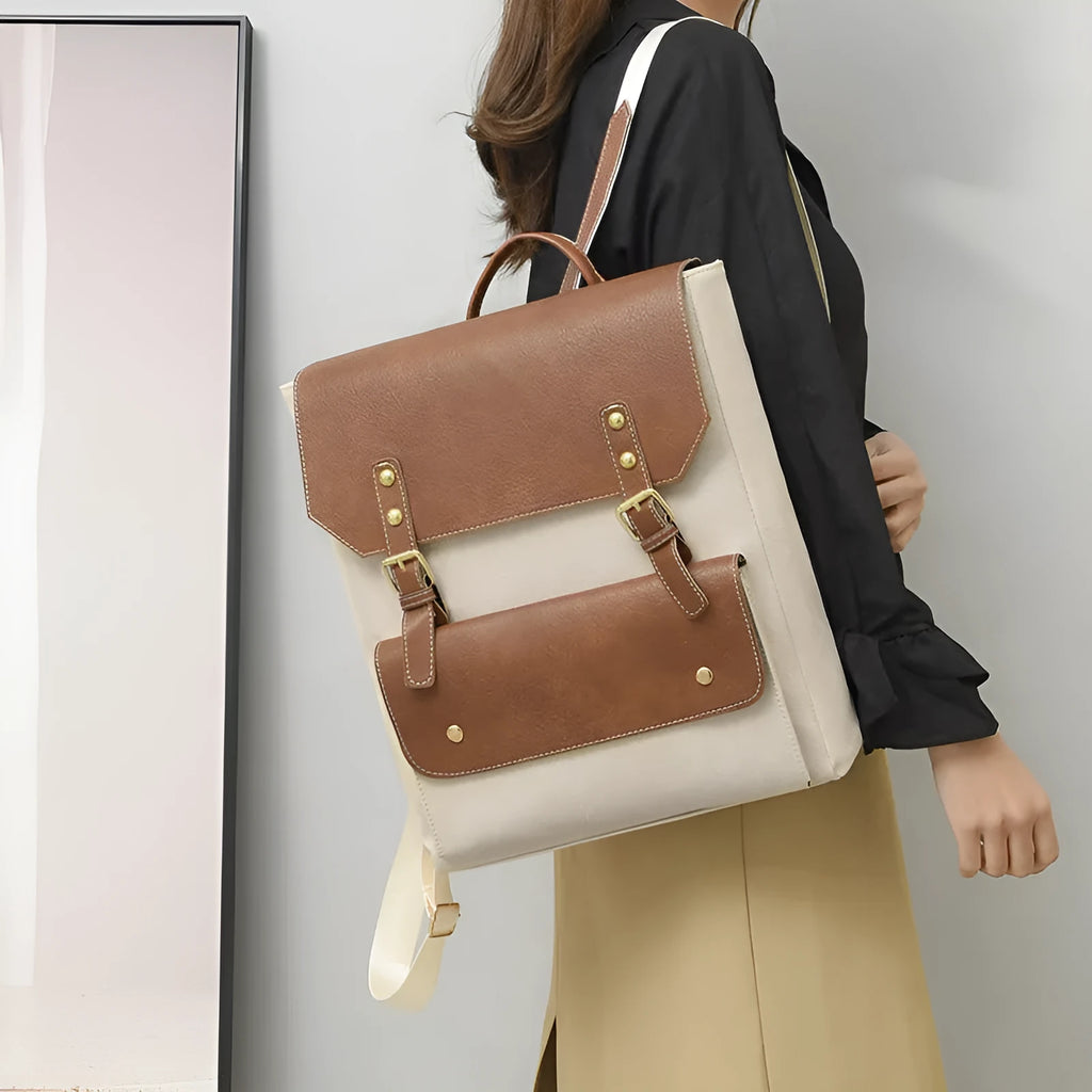Retro-style soft PU backpack in brown colour, showing front design and straps.