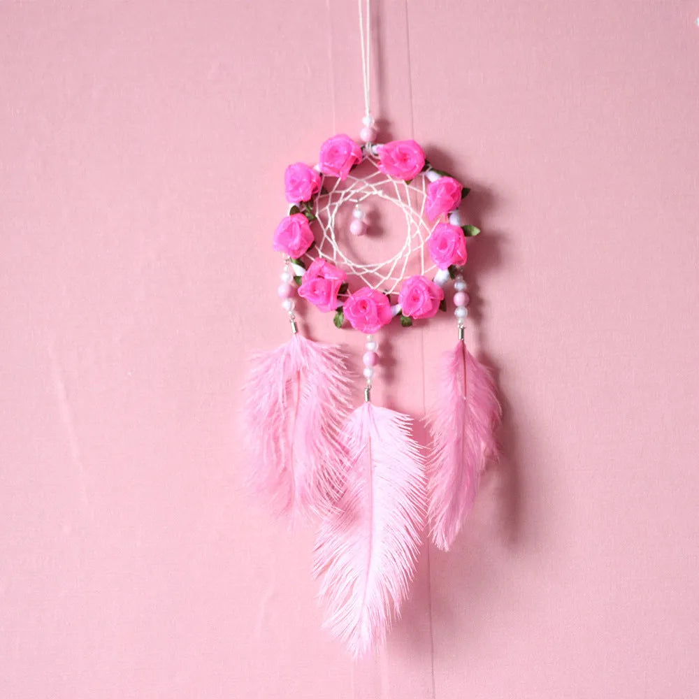Pink ostrich feather dreamcatcher wind chime wall decoration measuring 10cm