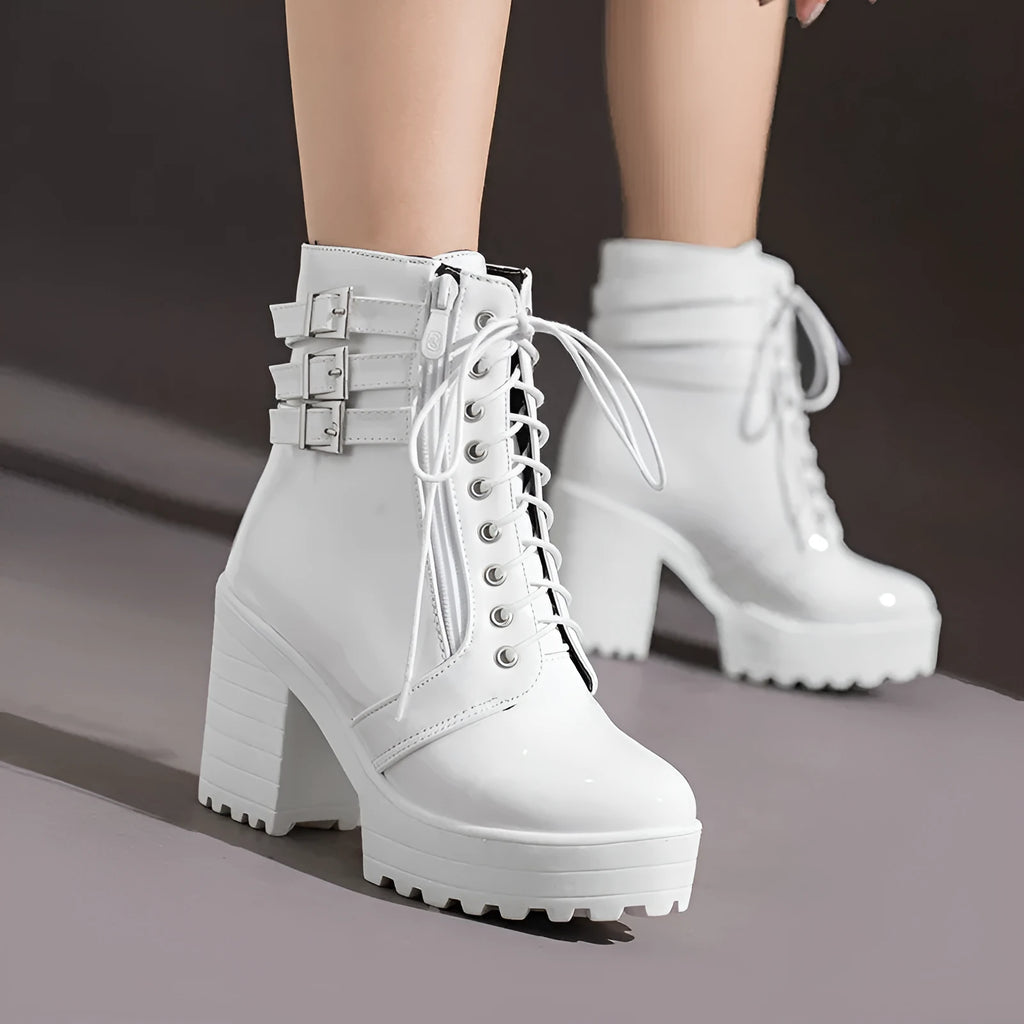 Women's black chunky heel ankle boots with lace-up front and round toe.
