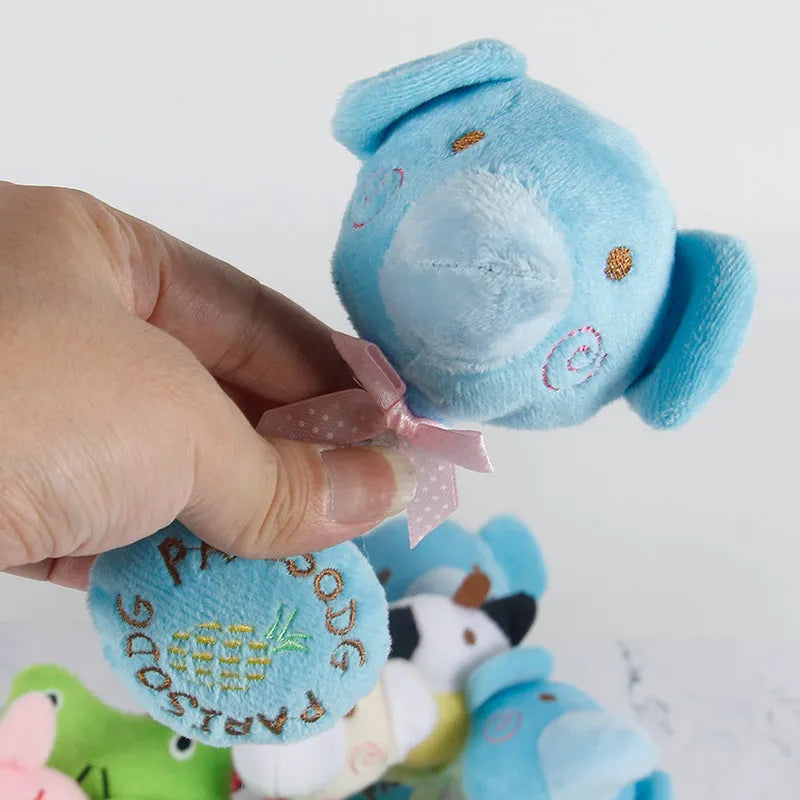 Plush animal dog toy with cotton rope and squeaker in frog, elephant, cow, and bear designs.