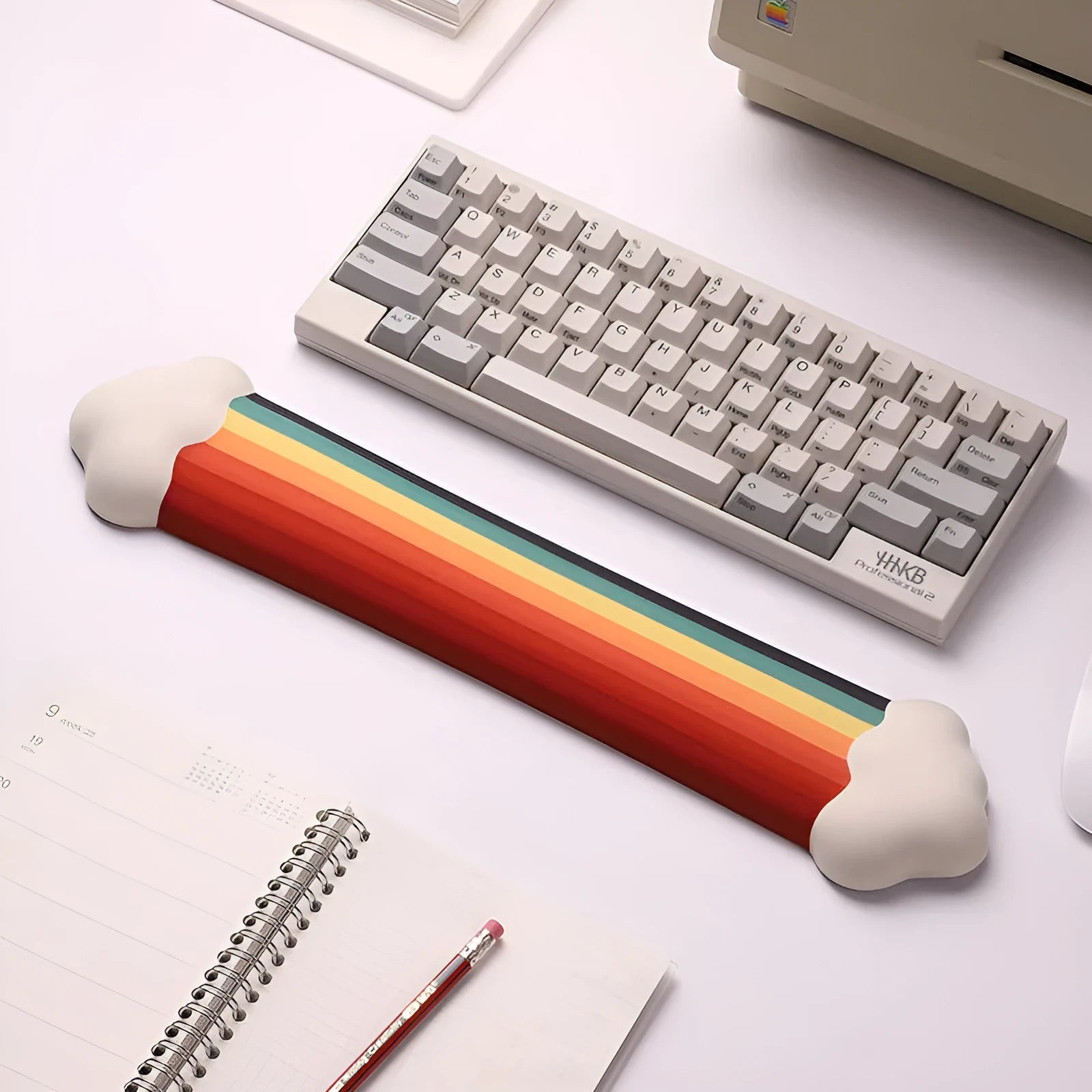 Silicone wrister mouse pad and keyboard holder set with printed cloud patterns in four colour options.