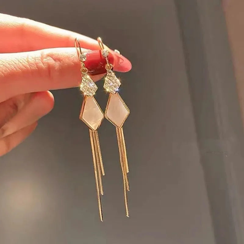 Alloy tassel strip earrings with electroplated finish in white showing Gang Diamond Ice Flower design