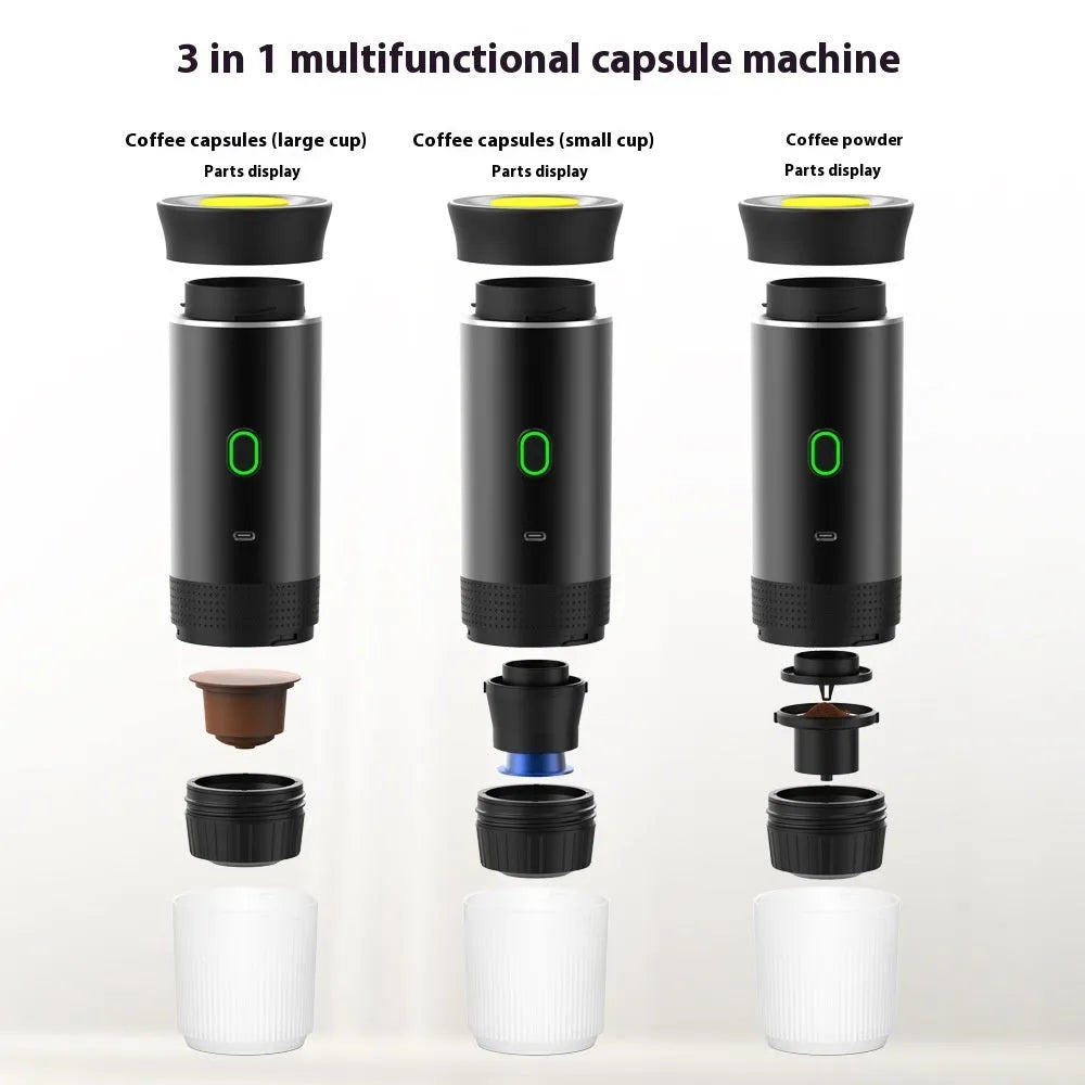 Portable electric espresso machine in grey with USB charging cable, shown next to coffee capsules