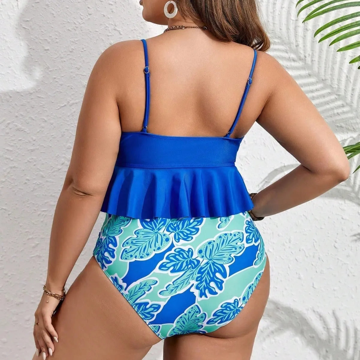Blue polyester fibre bikini set with top and shorts for sizes 0XL to 4XL.