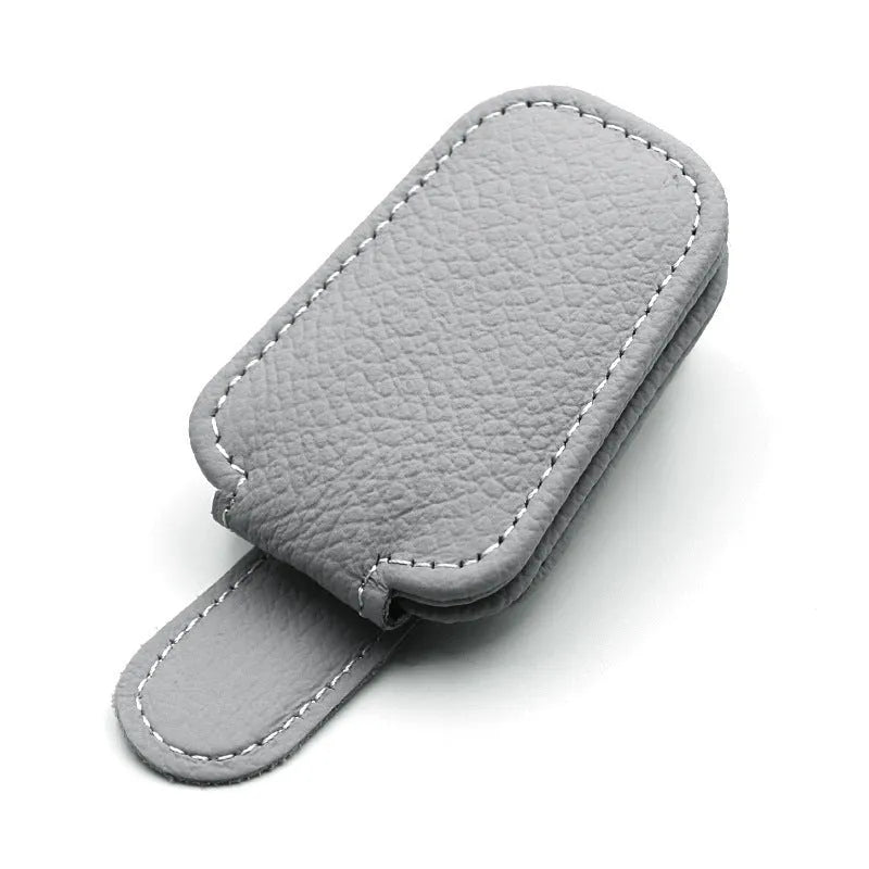 PU leather car sunglasses clip holder attached to a car sun visor