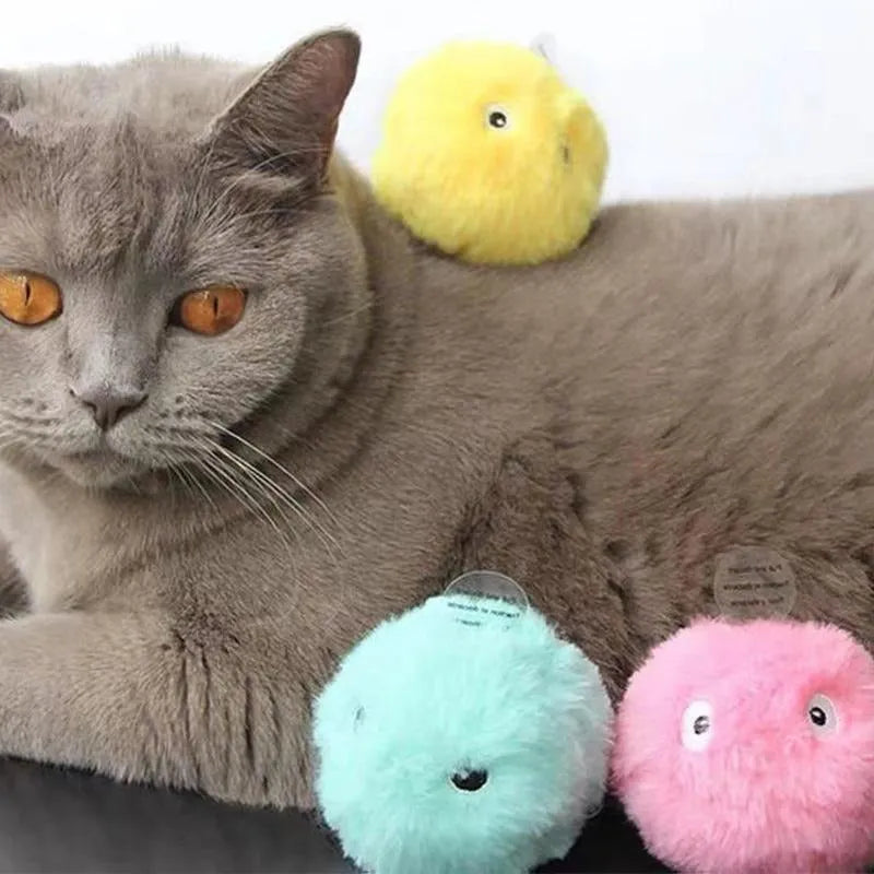 Blue, pink and yellow interactive cat toy balls that make animal sounds