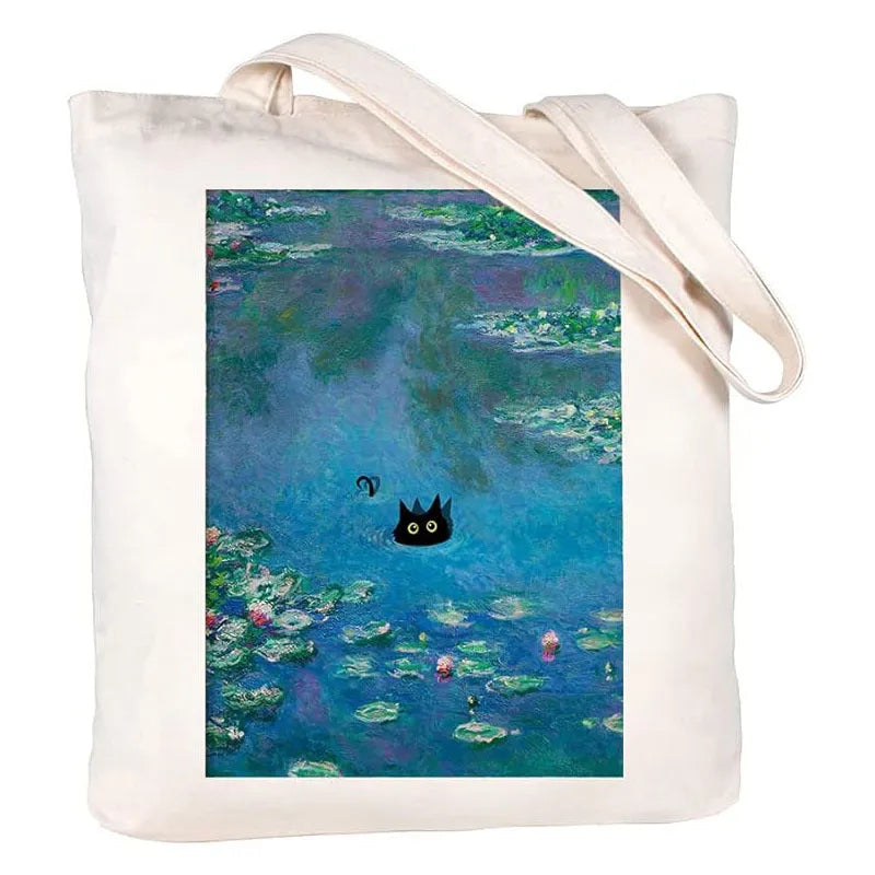White canvas hand shopping bag with Halloween digital print, 34 by 42 centimetres, on plain background