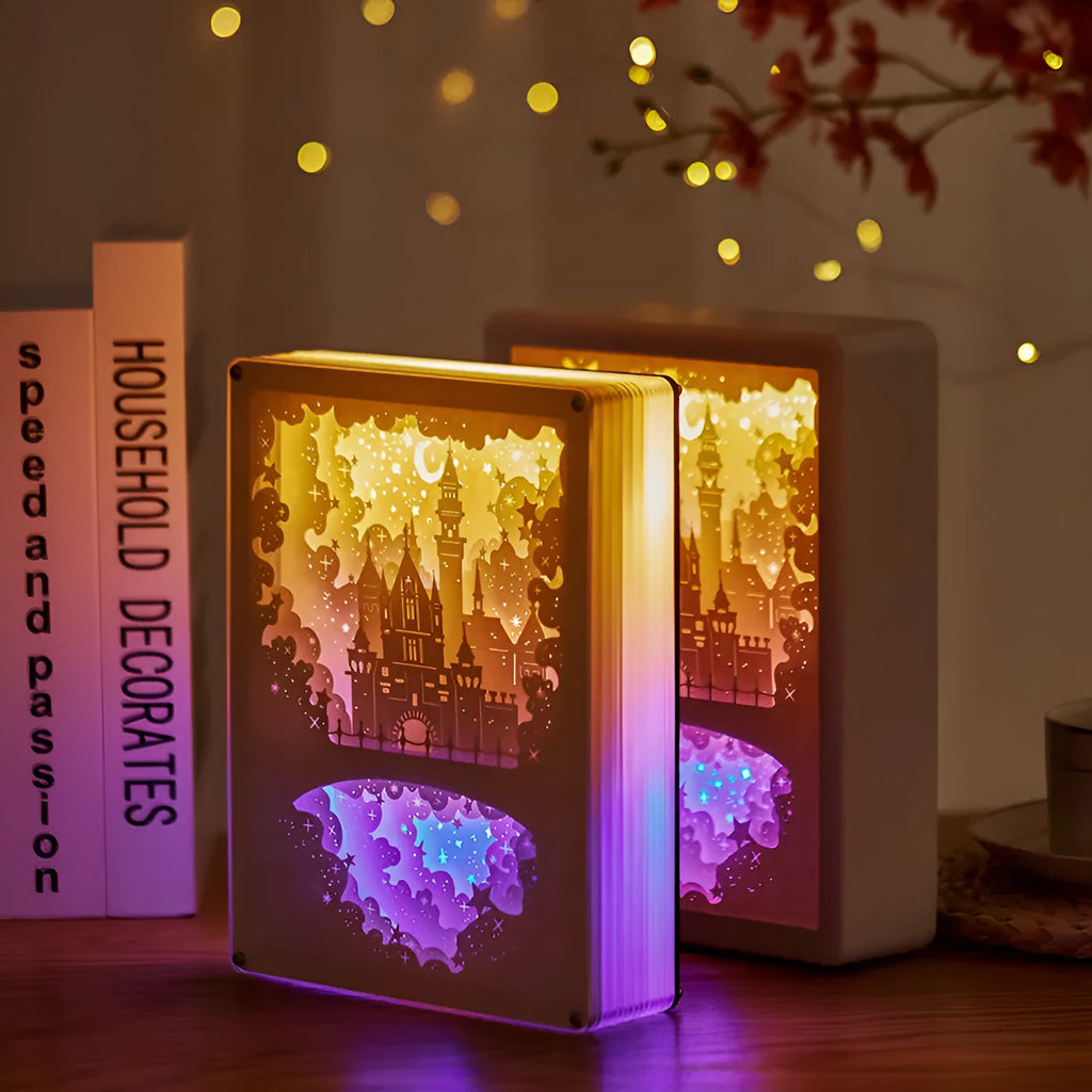 Modern bedside night light with three-dimensional paper carving design showing yellow illumination through ABS and acrylic frame
