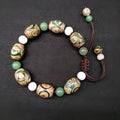 Green agate Tibetan beads bracelet with three-eye design and geometric ethnic patterns