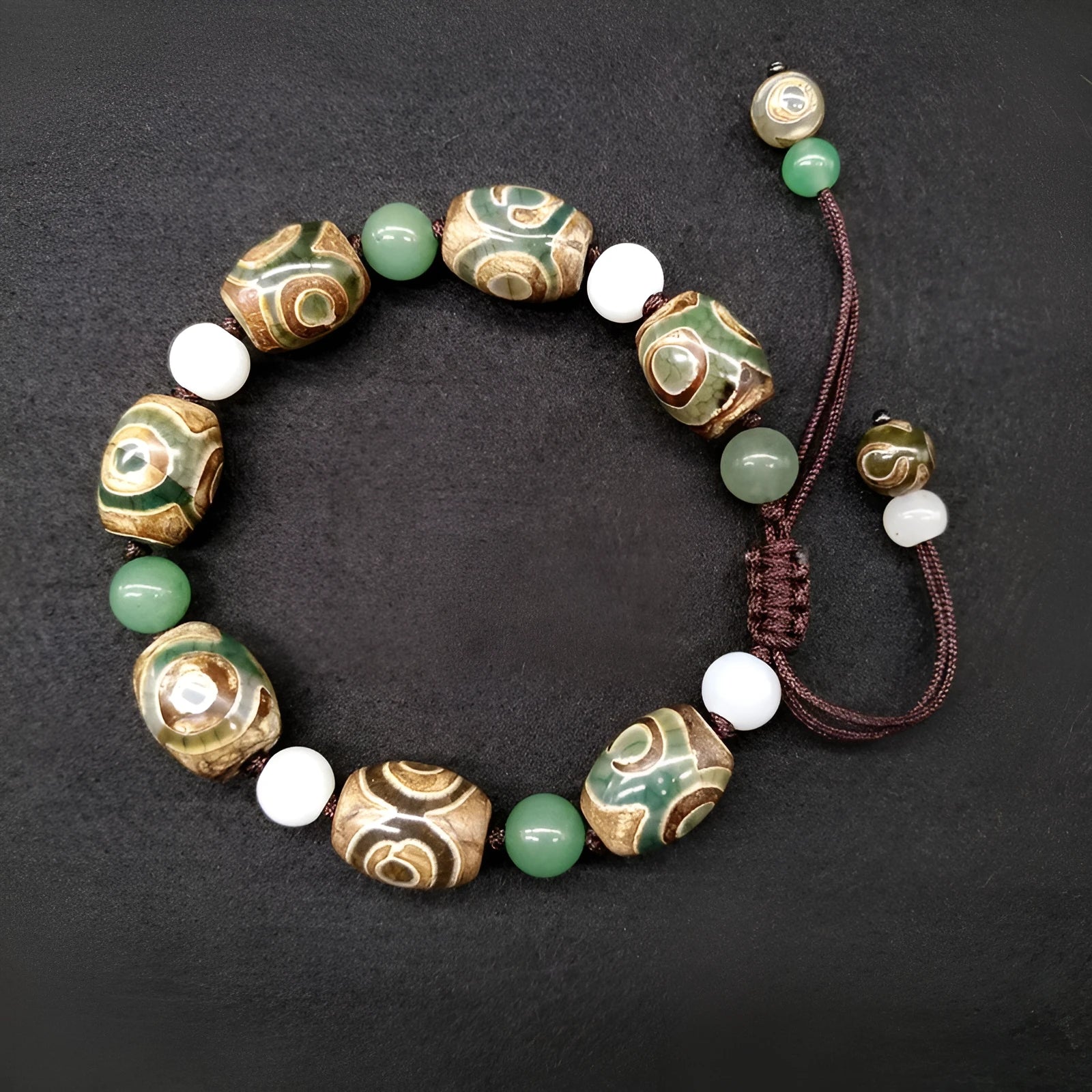 Green agate Tibetan beads bracelet with three-eye design and geometric ethnic patterns