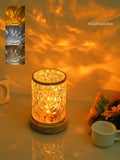 Rotating water ripple night light with acrylic shade and wooden base showing colourful lighting mode
