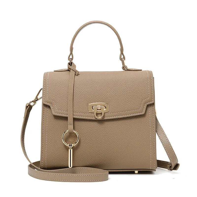 Elephant grey genuine leather handbag with vintage lock and litchi pattern texture