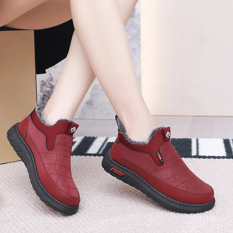 Women's black casual flat boots with round toe and non-slip rubber sole