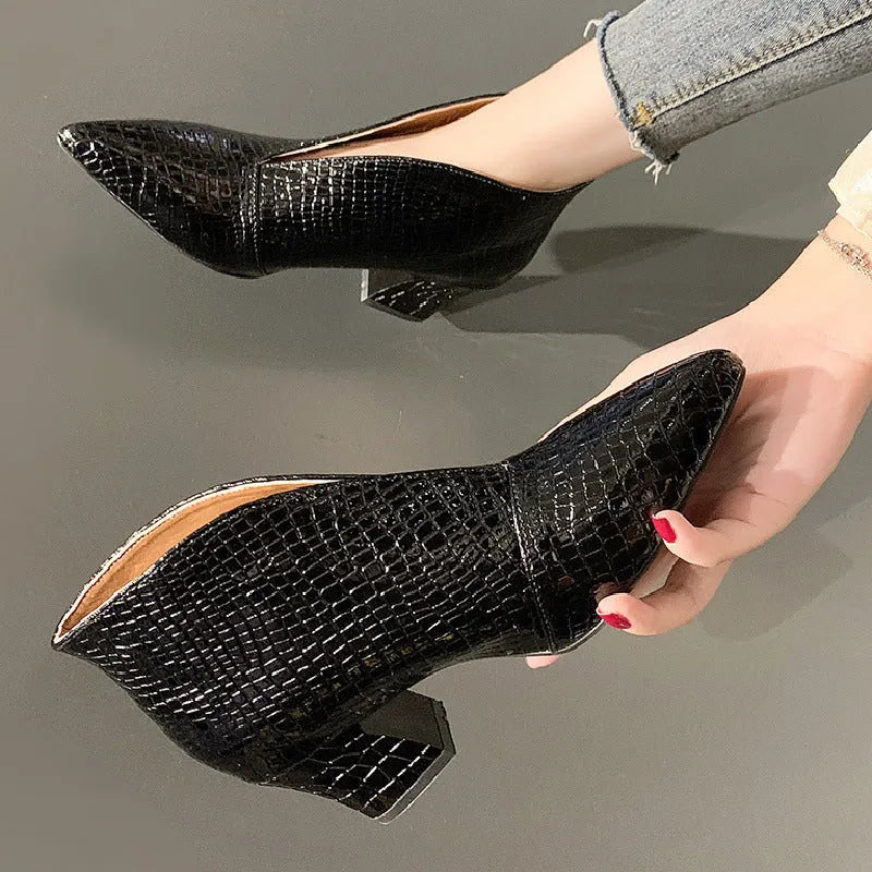 Black women's V-cut pointed ankle boots with an embossed PU upper and a chunky block heel.
